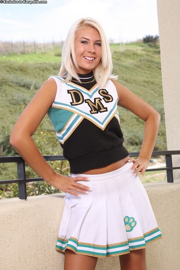Shaved blonde Danica Blue strips off her cheerleader uniform and snow white underwear
