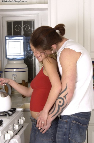 Denice Klarskov gives head and gets her hairless pussy pumped in the kitchen