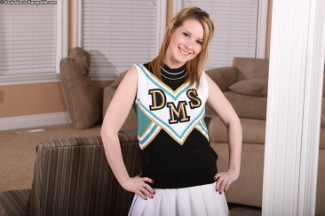 Shaved teen Tweety Valentine removes her cheerleader uniform and then her virgin white panties