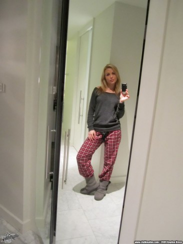 Self shots of big boobed sexy assed blonde model Kayden Kross posing in the bathroom