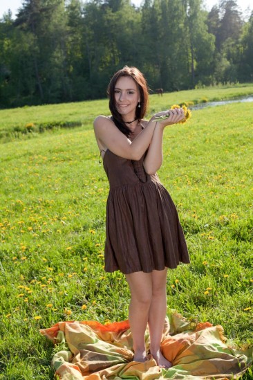 Brunette teen Victory Nubiles willing to enjoy the soft green grass and tender sun with naked body