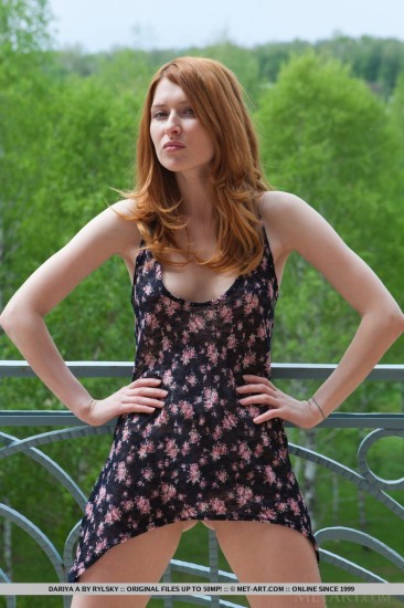 Redhead bimbo Dariya A is posing outdoor baring off boobs and spreading rimmed pussy