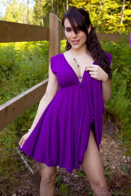 It is more than time for busty Katie Banks to take off her purple dress and show off.