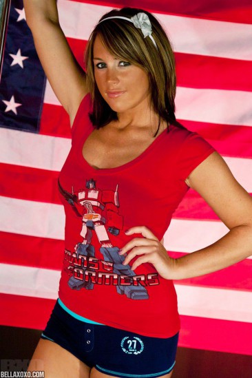 Sassy bimbo Nikki Anne is dancing the hottest strip tease at the American flag