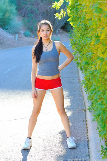 Filthy Latina teen Megan Salinas is shaking nude boobs when doing exercises outdoor