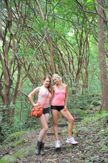 Lena Nicole and her sweet girlfriend Melody Jordan go to the woods and play with their slits there