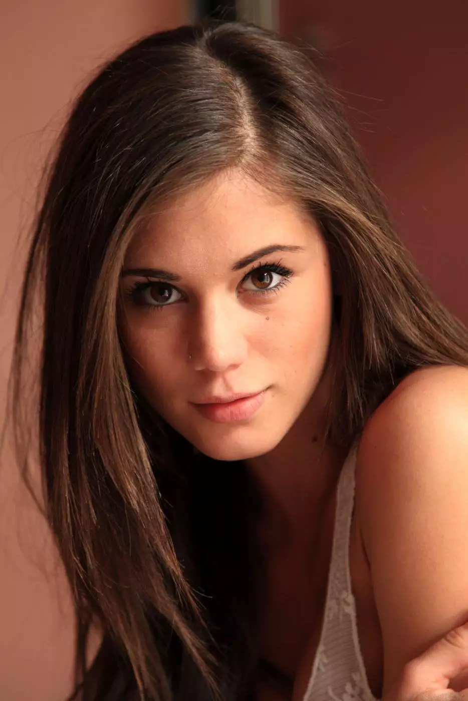 Pretty babe Little Caprice spreads her smooth legs and shows off her juicy cunt