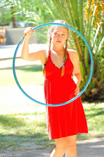 Sweet blonde teen with pigtails Aurielee Summers gets rid of her red dress outside and teases