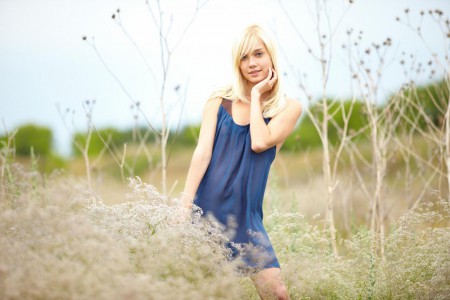 Charming blonde chick Aljena A doesn’t hide her teen body when posing in the meadow
