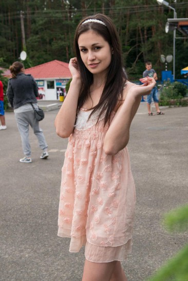 Elegant and graceful teen brunette Lilian A exposes her creamy bod outdoors