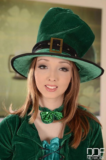 Adorable redhead with huge knockers Lucie Wilde poses in a sexy St. Patrick