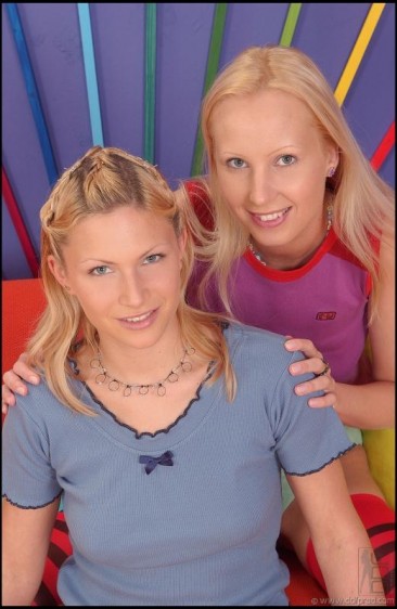 Dishy Kathy Blanche and her lesbian friend both in striped stockings licking multicolor toys