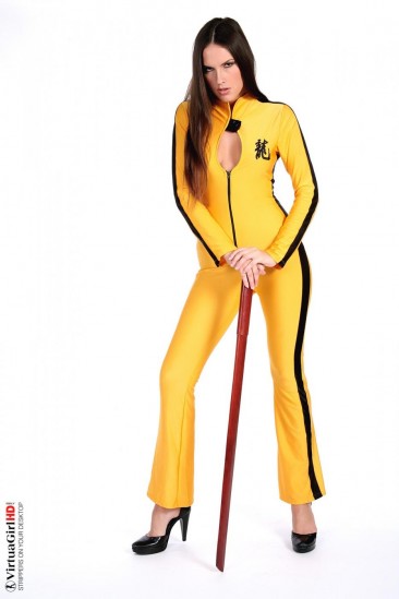Deny is such a hot brunette, dressed in a kill-bill style yellow suit looking sexy.