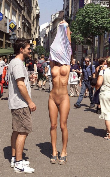 Completely nude immaculate missy Nelli Hunter explicitly posing in public.