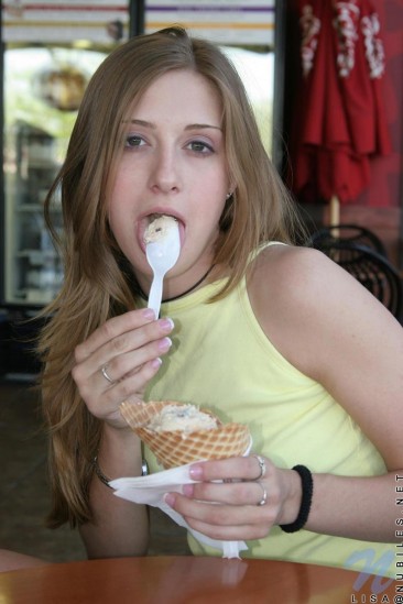 Barely legal teaser Lisa Nubiles in yellow top tempts and teases while eating ice cream.