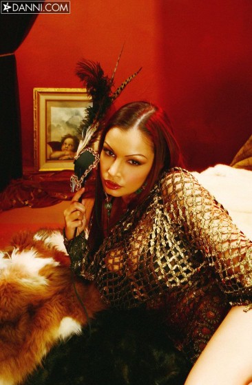 Lounging back and relaxing with her naughty fantasies Aria Giovanni looks like a vision of beauty