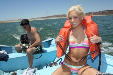 Blue eyed blonde girl Kacey Jordan gets her bald pussy fucked on a boat after fishing
