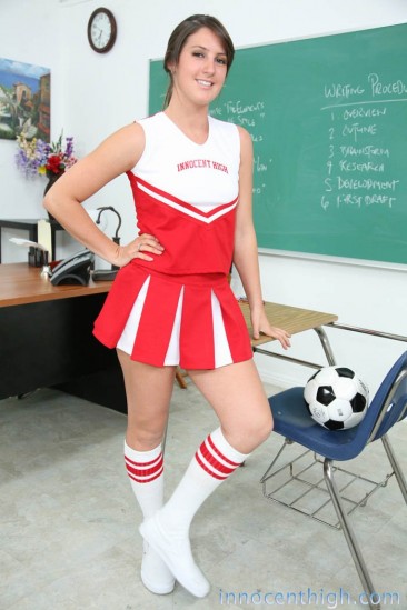 Slutty cheerleader Bailey Lane in red and white uniform gets fucked in the classroom