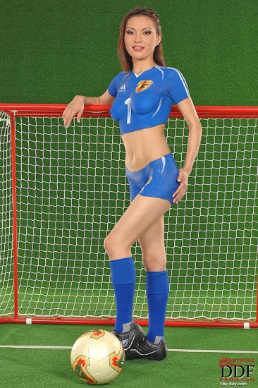 Oriental body art model Annie Ling pretends that she wears blue skin tight soccer uniform