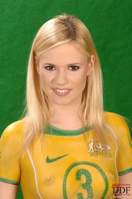 Body art cutie Yasmine Gold pretends that she wears Australian green and yellow soccer uniform
